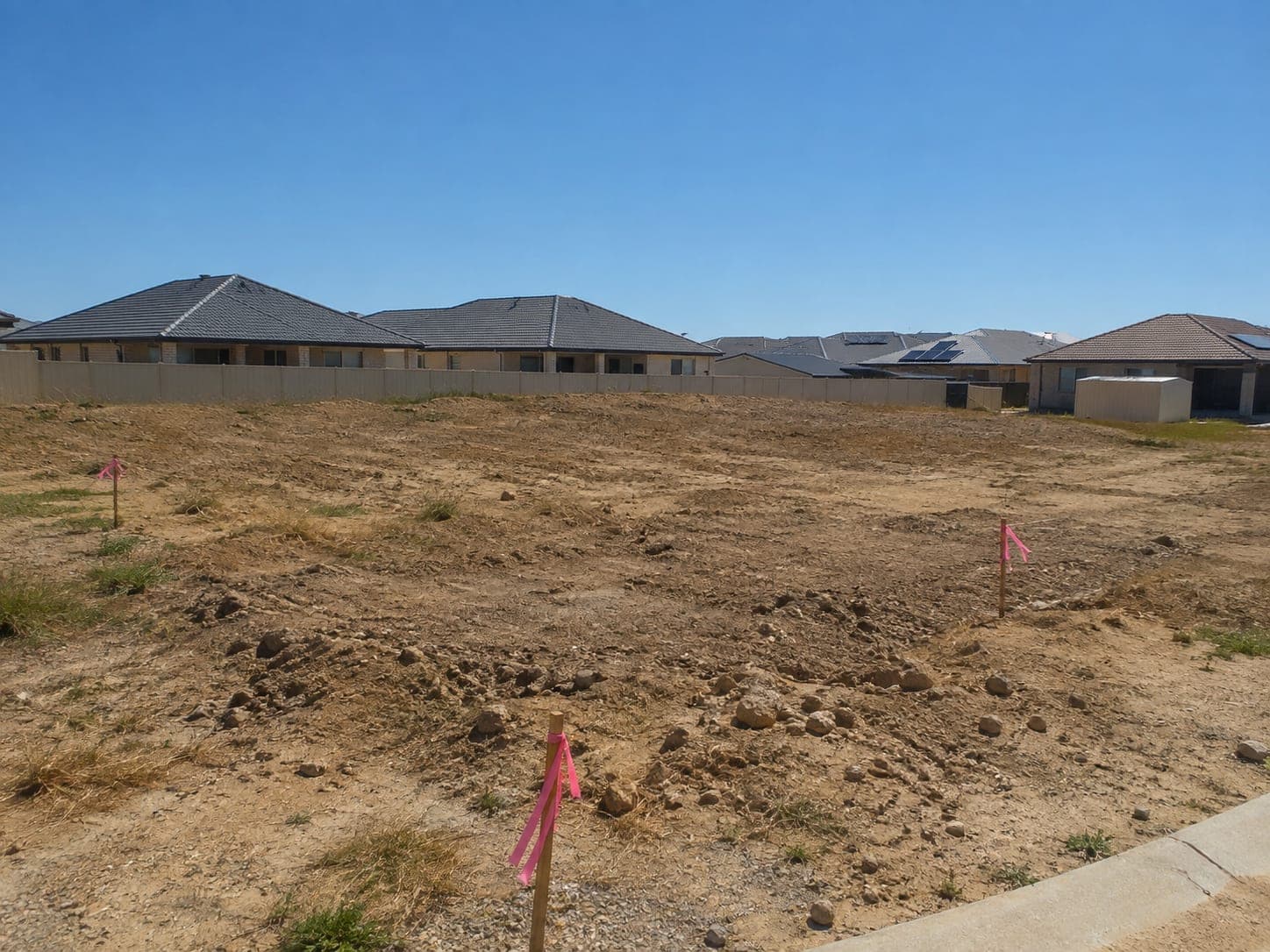 Unlevelled new-estate block before sand pad preparation, Baldivis
